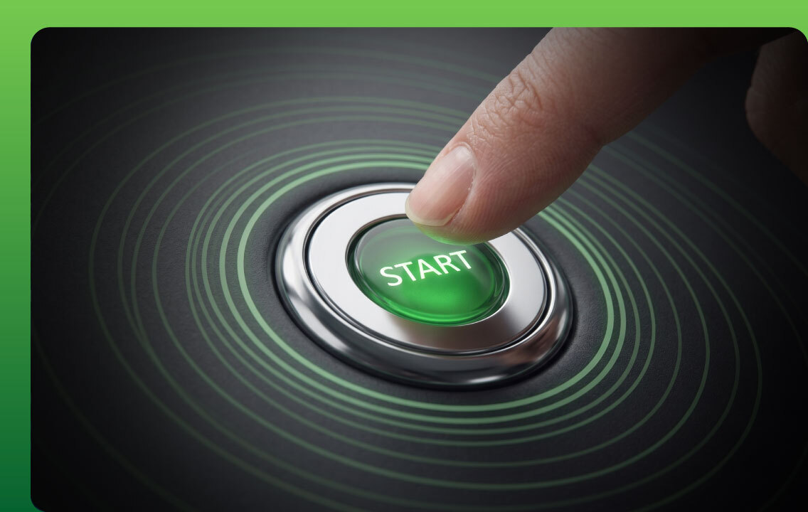 Close-up of a finger pressing a glowing green "START" button, symbolizing Omnistrate's new frictionless onboarding and one-click control plane generation.